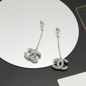 Длинные двусторонние серьги Chanel с бриллиантами — модные серьги