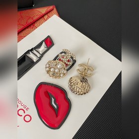 Серьги Chanel в форме ракушек с морем и морепродуктами пользуются