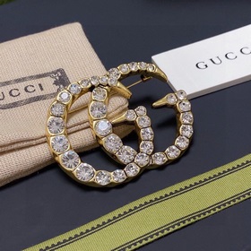 Ретро-брошь Gucci, полностью инкрустированная бриллиантами, являе