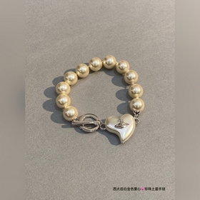 Ожерелье Vivienne Westwood Saturn Bracelet. Британский модельер,