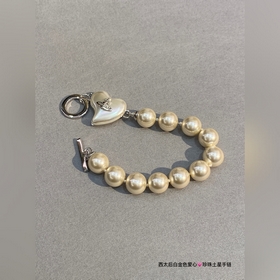 Ожерелье Vivienne Westwood Saturn Bracelet. Британский модельер, 
