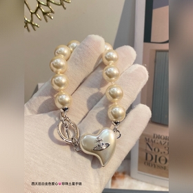 Ожерелье Vivienne Westwood Saturn Bracelet. Британский модельер, 
