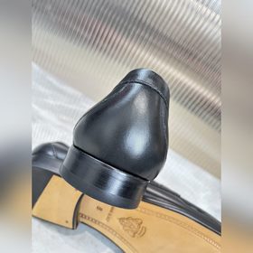 Мужские лоферы Gucci в новом исполнении с мотивом пряжки виде кон