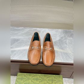 Мужские лоферы Gucci в новом исполнении с мотивом пряжки лоферами