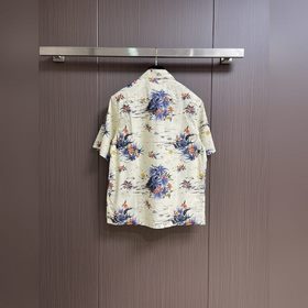 Короткорукавная рубашка Prada Hawaii с принтом. Эта хлопковая руб