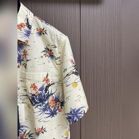 Короткорукавная рубашка Prada Hawaii с принтом. Эта хлопковая руб