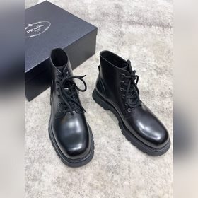 Мужские высокие ботинки Prada поступили в продажу в магазинах. Ве