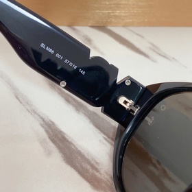 SAINT LAURENT . Новинки SL M86 Логотип SAINT LAURENT на ножке Ра
