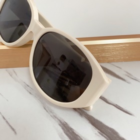 SAINT LAURENT . Новинки SL M86 Логотип SAINT LAURENT на ножке Ра