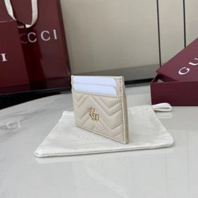 Этот кожаный кошелек GG Marmont изгото