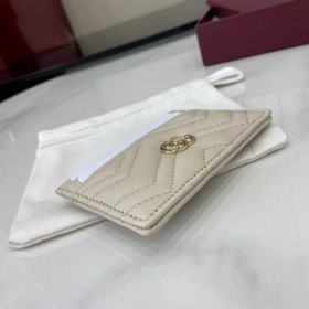 Этот кожаный кошелек GG Marmont изгото