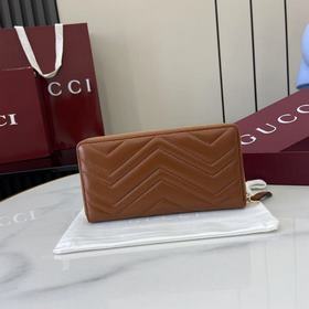 Этот кошелек GG Marmont с цепочкой-рем