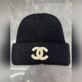 Шерстяная вязаная шапка Chanel Ткань и