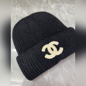Шерстяная вязаная шапка Chanel Ткань и