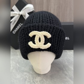 Шерстяная вязаная шапка Chanel Ткань и