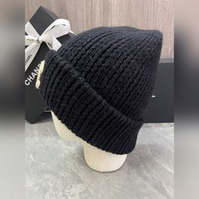 Шерстяная вязаная шапка Chanel Ткань и