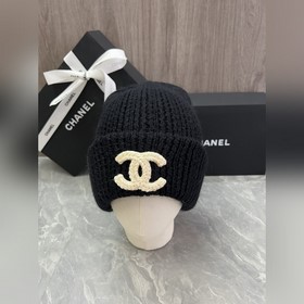 Шерстяная вязаная шапка Chanel Ткань и