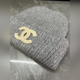 Шерстяная вязаная шапка Chanel. Ткань 