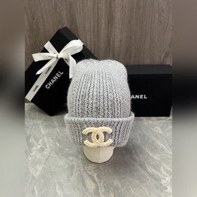 Шерстяная вязаная шапка Chanel. Ткань 