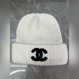 Шерстяная вязаная шапка Chanel Ткань и