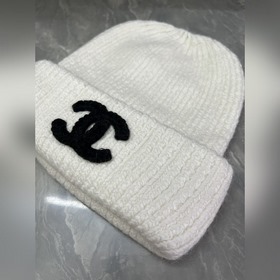 Шерстяная вязаная шапка Chanel Ткань и