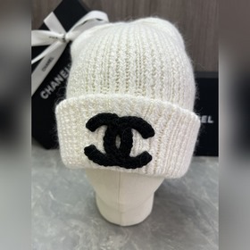 Шерстяная вязаная шапка Chanel Ткань и