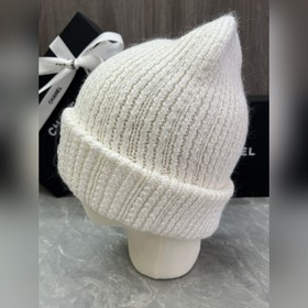 Шерстяная вязаная шапка Chanel Ткань и