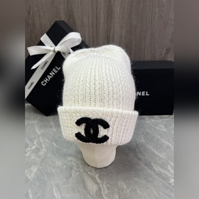 Шерстяная вязаная шапка Chanel Ткань и