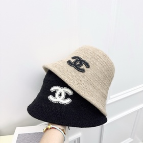 CHANEL  Новая шерстяная вязаная шапк