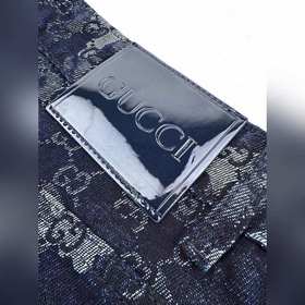 Брюки Gucci из джинсовой ткани с жакка