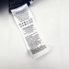 Брюки Gucci из джинсовой ткани с жакка