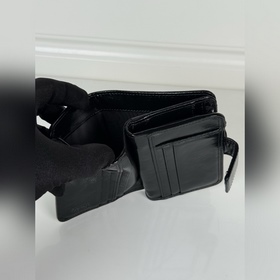 Короткий кожаный кошелек PRADA из черн