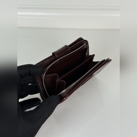 Короткий кошелек PRADA из коричневой в