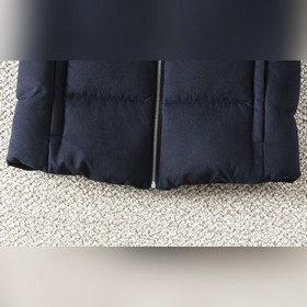 Пуховая жилетка PRADA с воротником-сто