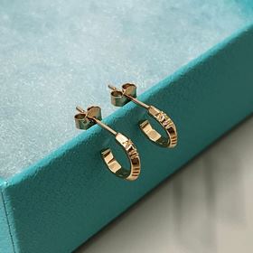 Серьги-гвоздики Tiffany с римскими циф