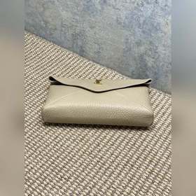 Большой клатч YSL в цвете «молочный ча