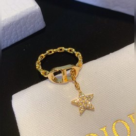 Кольцо Dior Star из того же материала,