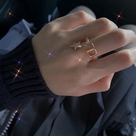 Кольцо Dior Star из того же материала,