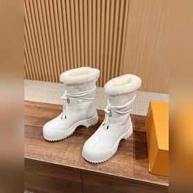 Ботильоны LOUIS VUITTON из овчины Эта