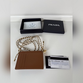 Женский кошелек Prada с клапаном и дер