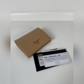 Женский компактный кошелек Prada с дву