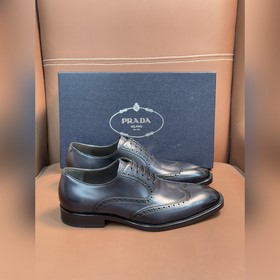 Классические кожаные туфли Prada с кож