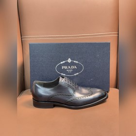 Классические кожаные туфли Prada с кож