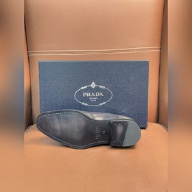 Классические кожаные туфли Prada с кож
