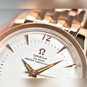 Часы Omega Seamaster 1948 в золотом и 