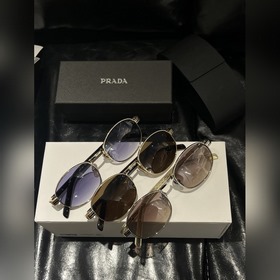 Оригинальные солнцезащитные очки Prada