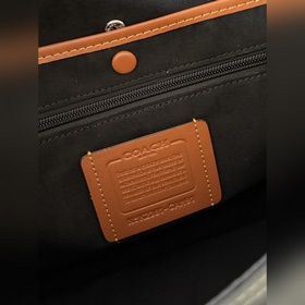Коричневая сумка-мессенджер Coach в ко