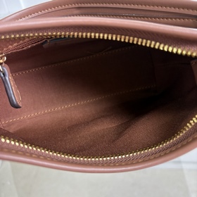 Коричневая сумка Coach в максимальной 