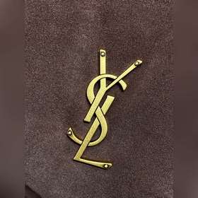 Коричневая сумка YSL Calypso отличаетс