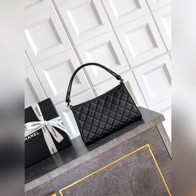 Черная сумка CHANEL 26x сияет звездным